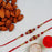 Red Pearl Thread Rakhi With Almonds