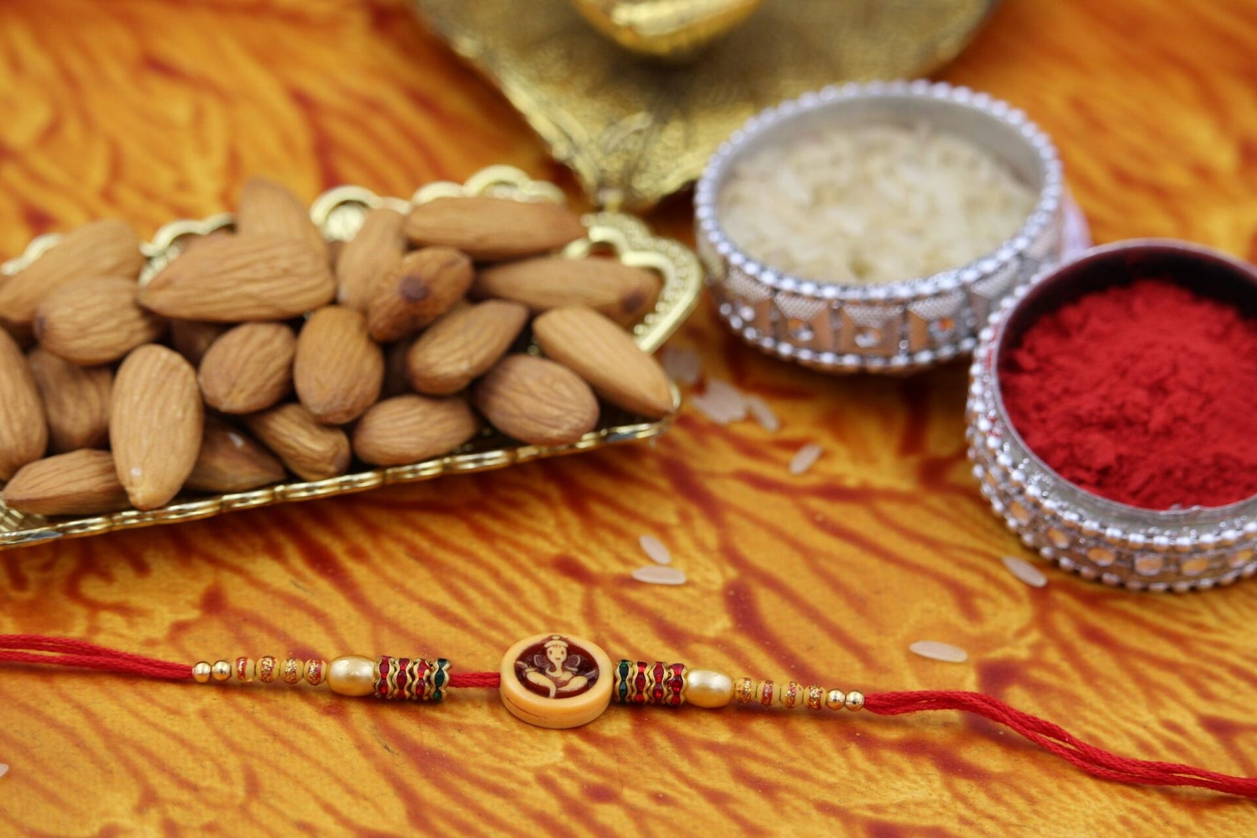 Ganesha Rakhi With Almonds