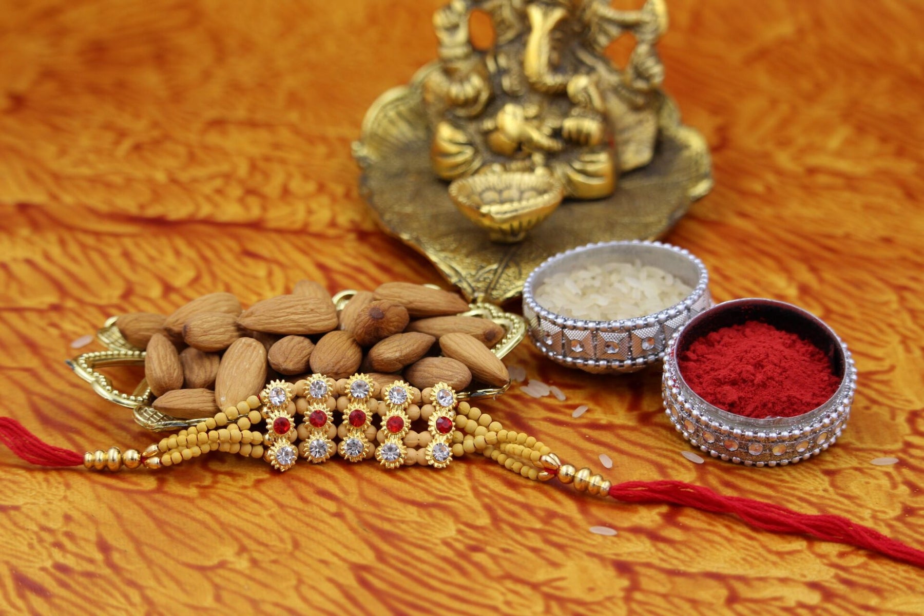15 Beads Rakhi With Almonds