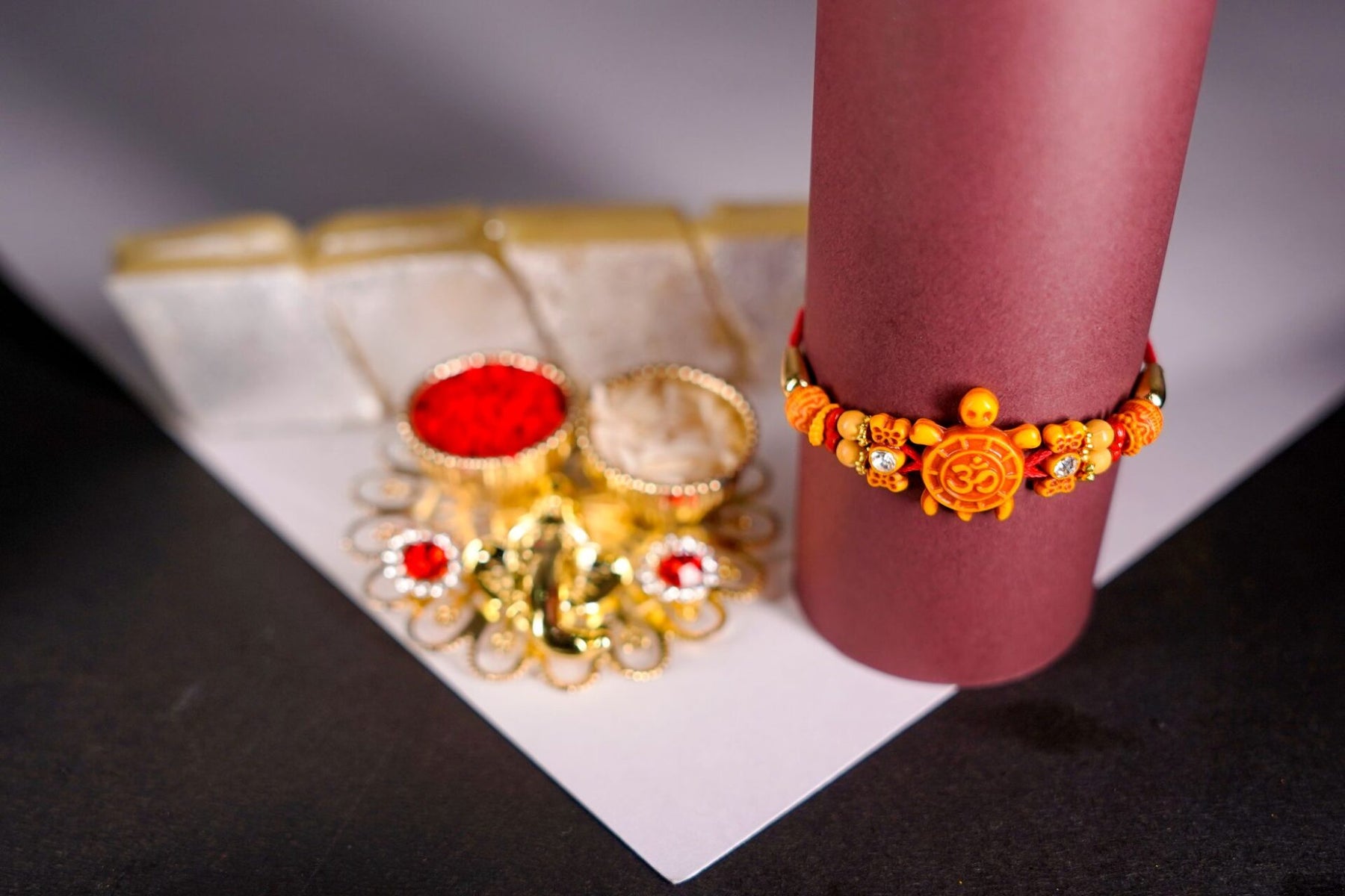 Kaju Katli Paired with OM Beads Rakhi