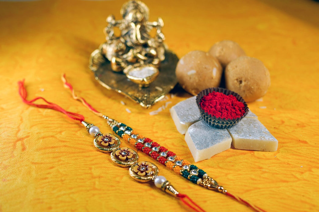 Kaju Katli and Besan Laddoo with Attractive Beads Rakhi Set