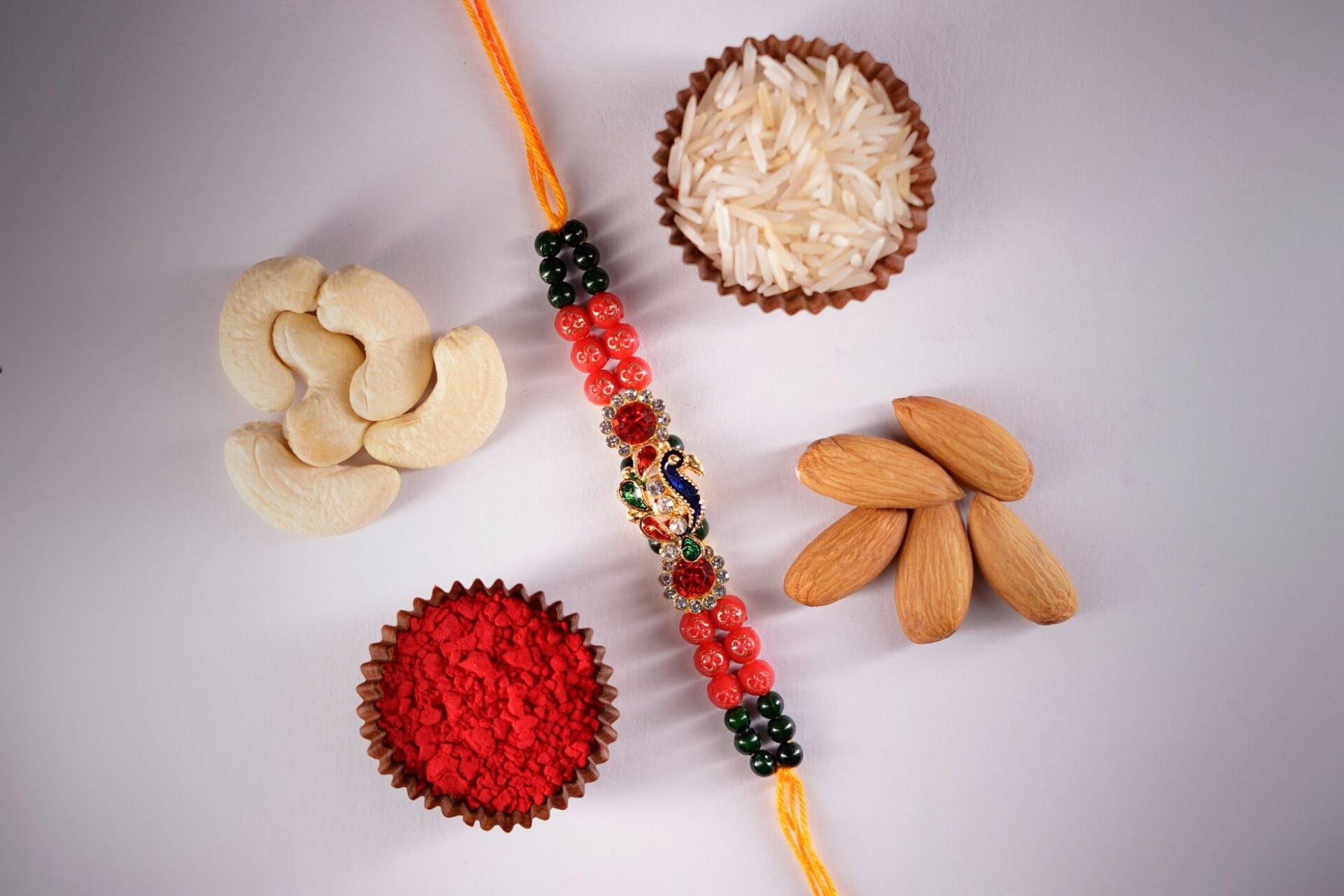 Cashewnuts and Almond With Peacock Rakhi Set