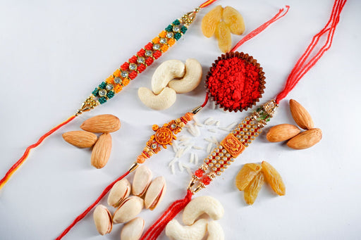 Triple Rakhi Threads Paired with Mix Dry Fruit