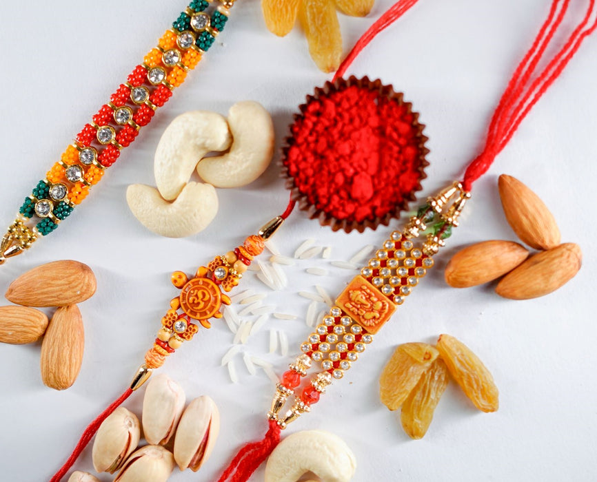 Triple Rakhi Threads Paired with Mix Dry Fruit