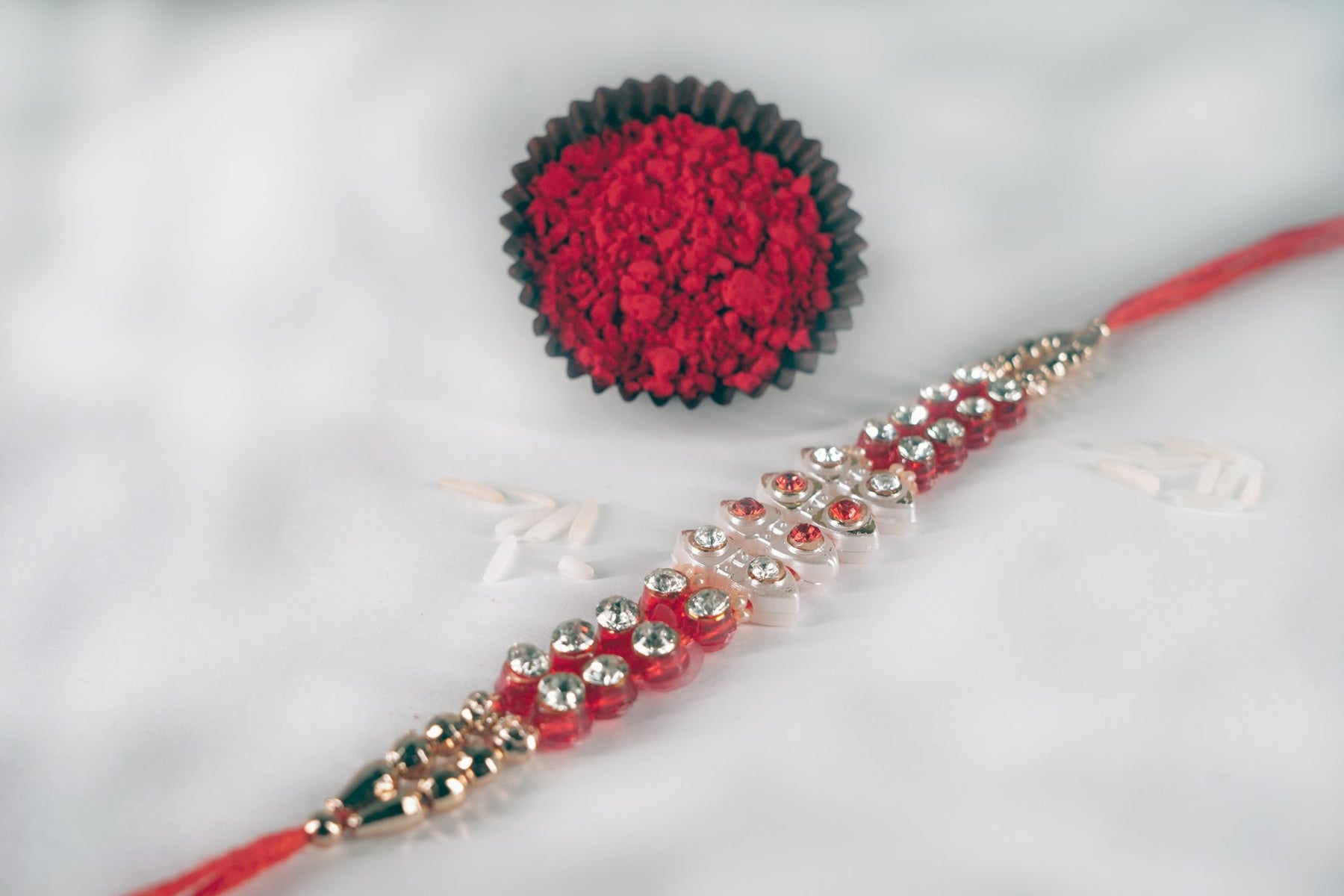 Beads Rakhi- Red Thread Rakhi