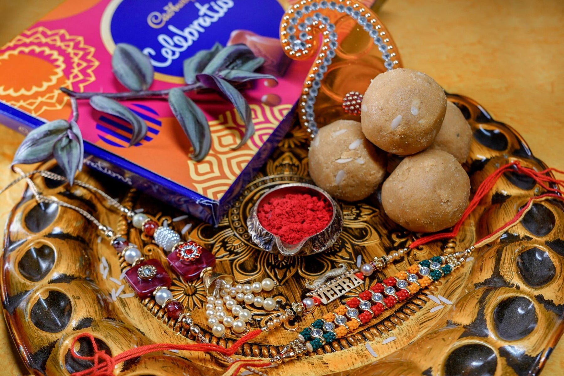 Multiple Rakhi Set with 200 gm Besan Laddoo, Thali and Celebration Box